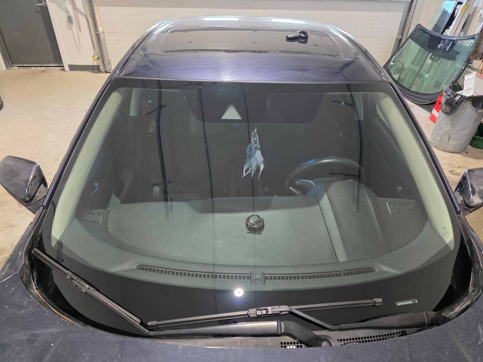 Anto Auto Glass technician at work